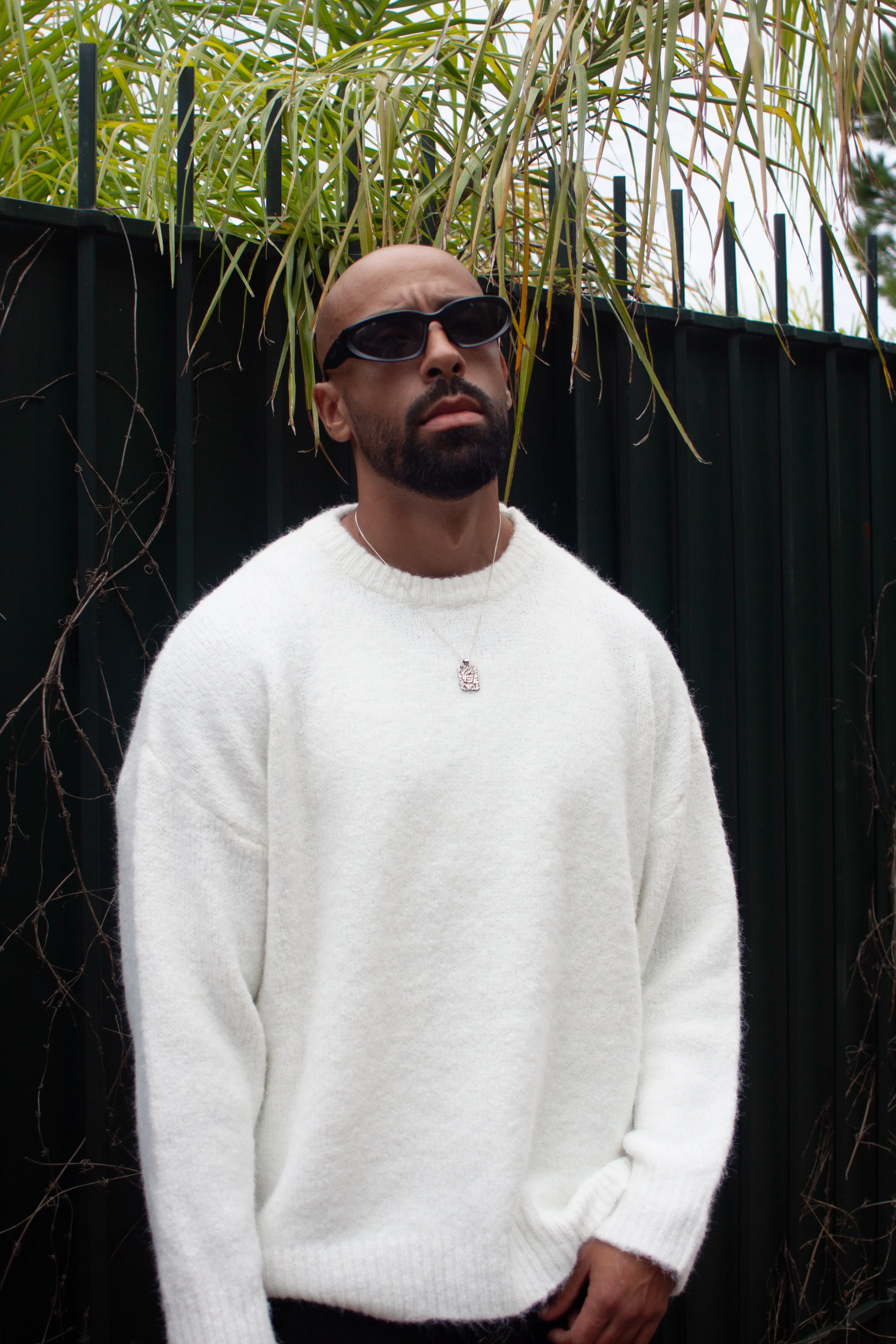 THE SARMATO OVERSIZED KNITTED CREWNECK SWEATER